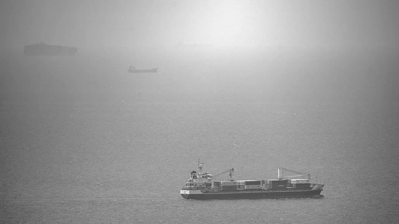 Cargo ship attacked by small craft near Strait of Hormuz, UK maritime agency says