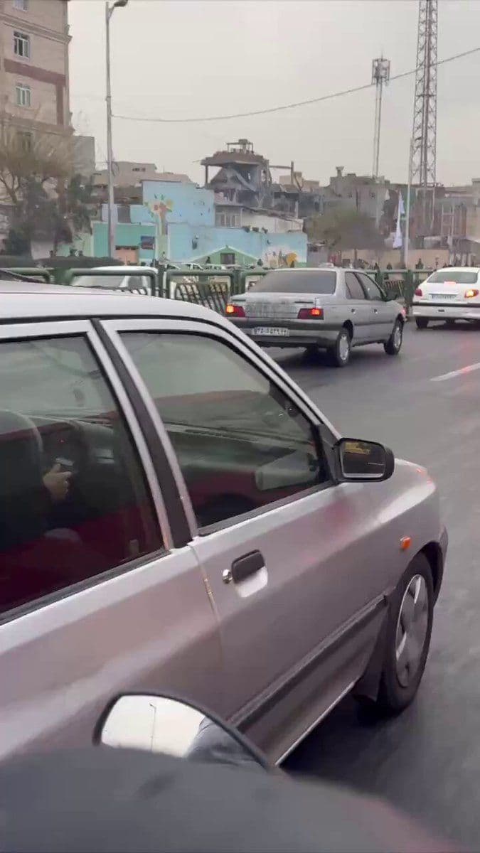 @Babak Taghvaee - The Crisis Watch: BREAKING: Video recorded this morning on Dastgheib Street in Shiraz shows the aftermath of an Israeli airstrike on a base belonging to the Basij paramilitary force of the IRGC terrorist organization.