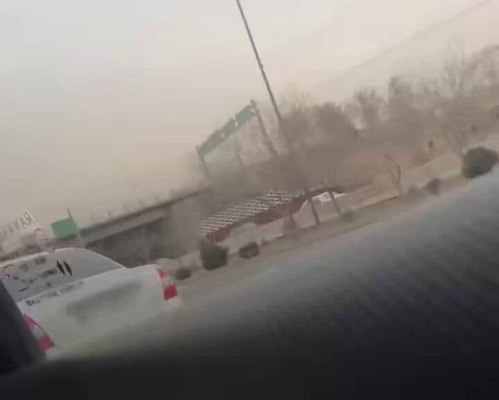 @Babak Taghvaee - The Crisis Watch: This footage recorded today on Azadegan Highway in Tehran shows Basij militia members of the IRGC terrorist organization setting up a roadblock under a bridge in order to avoid being hit by Mikholit a