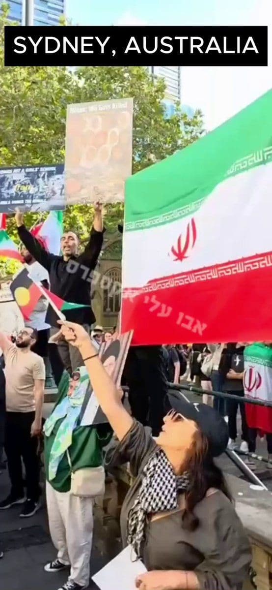 @Open Source Intel: Sydney, Australia: Iranian and Palestinian flags raised together as protesters chant,
“We are at your command, Khamenei.”