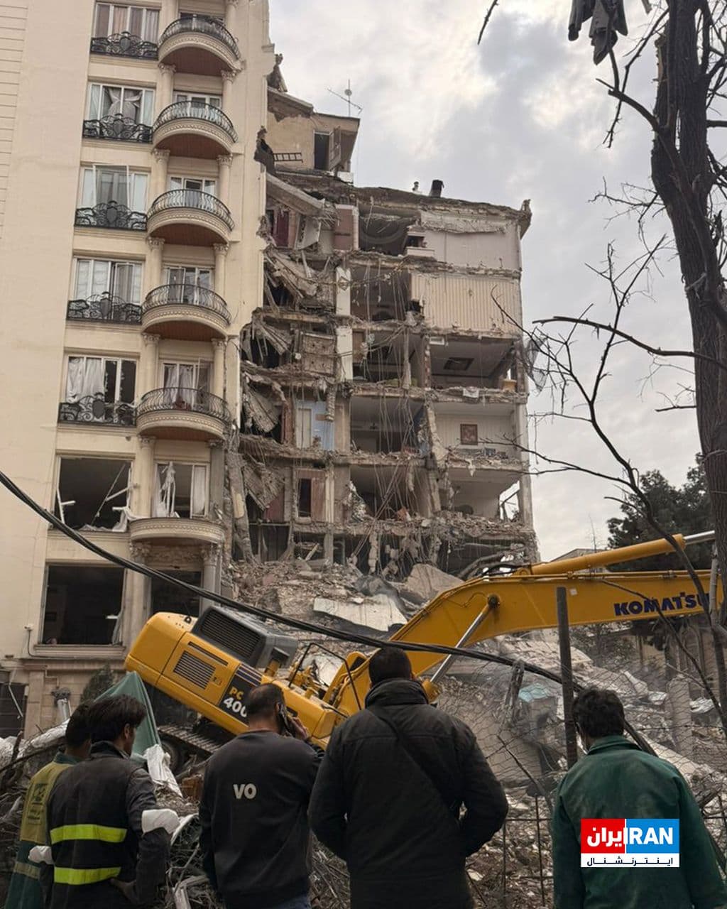 @ايران اينترنشنال: The image received by Iran International shows a building being targeted on Hashem Street, Andarzgoo Boulevard, in Tehran following a targeted airstrike.