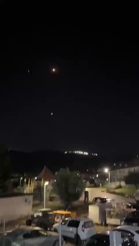 @Babak Taghvaee - The Crisis Watch: BREAKING: One of the ballistic missiles launched by the IRGC Aerospace Force at Israel tonight had its warhead section impact somewhere in the country. As seen in the footage, surface-to-air missiles