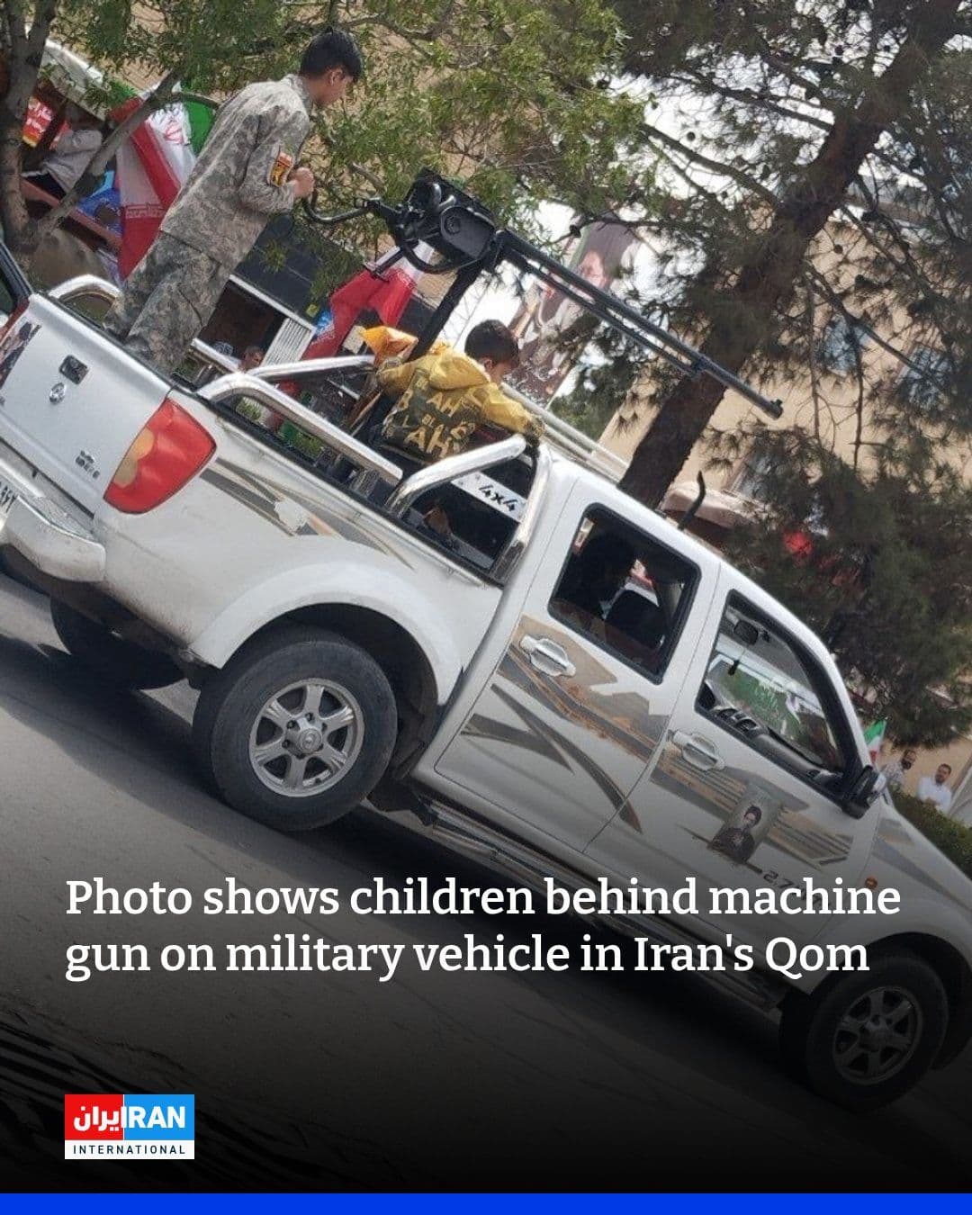 @Open Source Intel: IRAN: A photo circulating from Iran International shows children riding on a military vehicle in Qom, with one seated behind a mounted machine gun wearing IRGC attire.