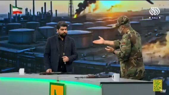 @Babak Taghvaee - The Crisis Watch: This has happened inside a studio of the state media of Iran’s Islamic regime in Tehran. An officer of the IRGC Ground Force can be seen teaching the audience how to use and fire an AK-47 assault rifl