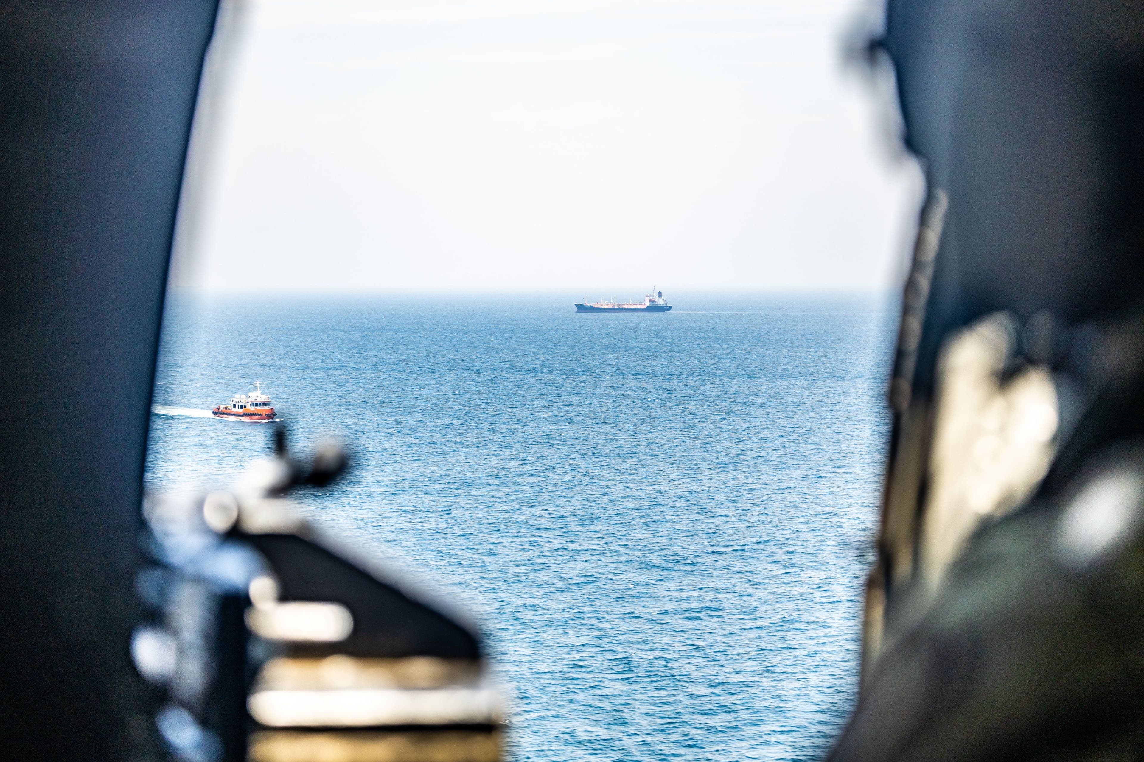 @U.S. Central Command: A U.S. Army helicopter observes commercial ships while flying over regional waters near the Strait of Hormuz during U.S. enforcement of the maritime blockade against Iran.
As of May 16, 78 commerci